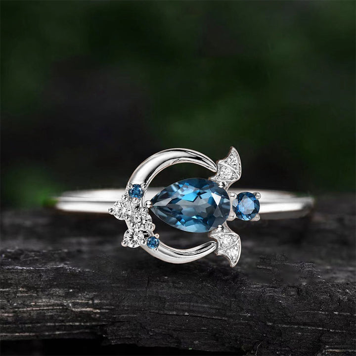 Olivenorma "Keep Close to Joy" - Unique Bat Cut Blue Topaz Ring