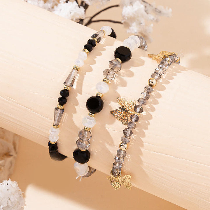 Olivenorma Crystal Beaded Gold Butterfly Pendant Three Layer Bracelet Set