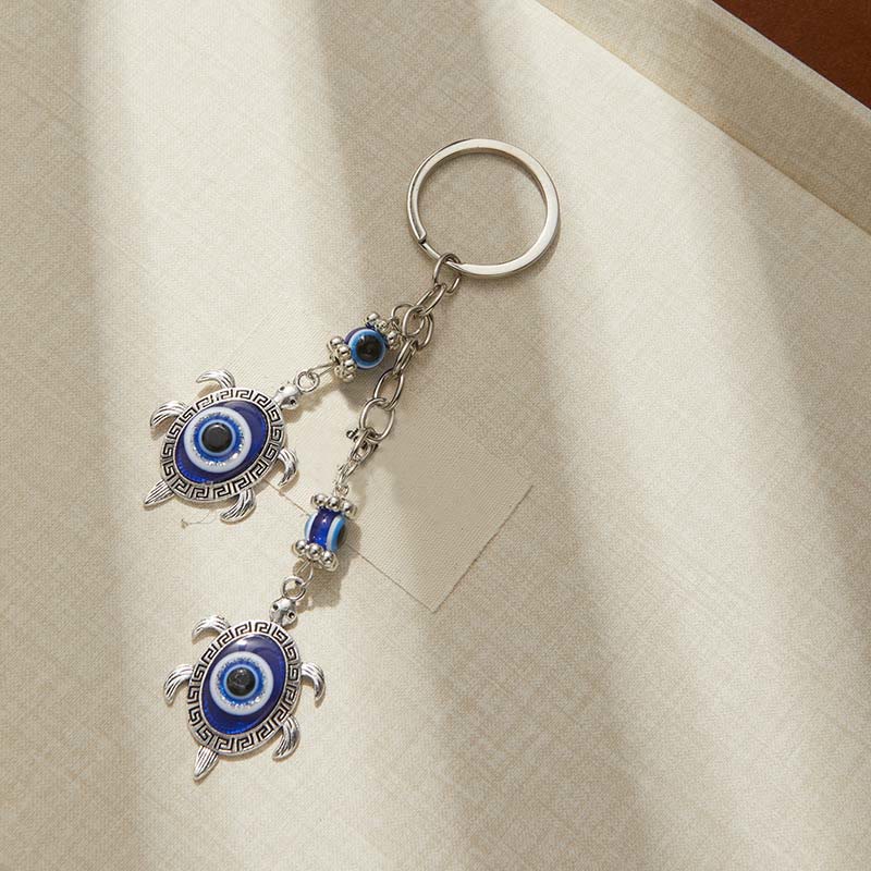 Olivenorma Creative Keychain with Blue Evil Eye & Animal/Plant Details - image 1