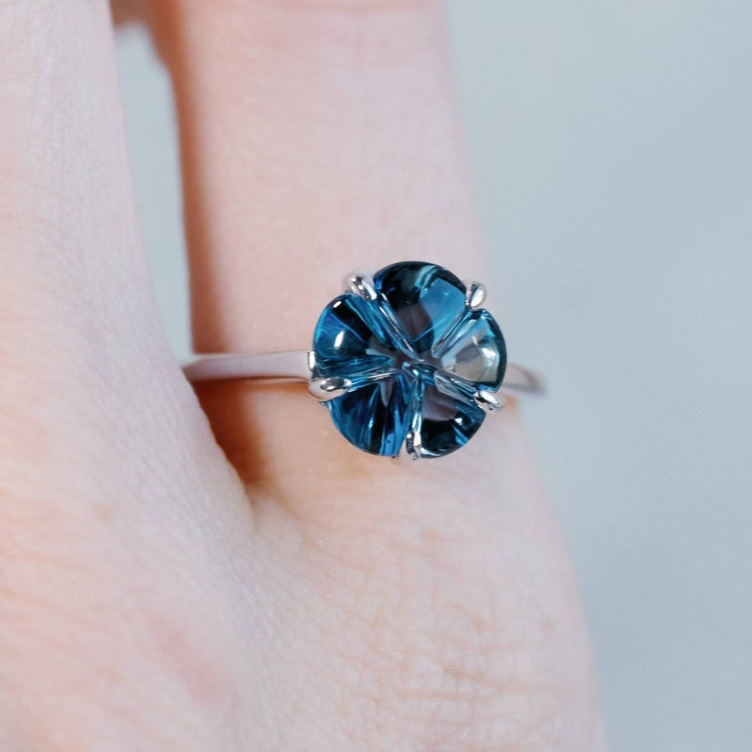 FREE Today: Five Petal Flower Gemstone Blue Topaz Ring - image 1