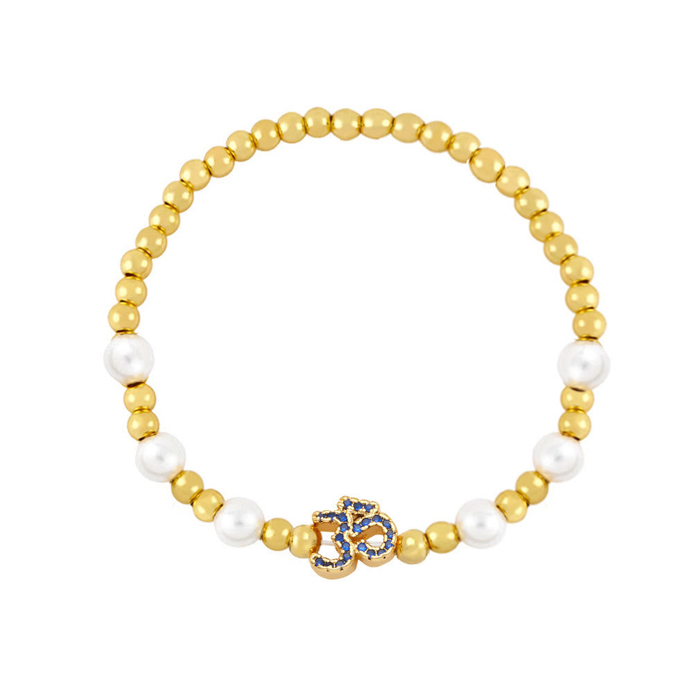 Olivenorma Brass Pearl Beaded Om Symbol Bracelet