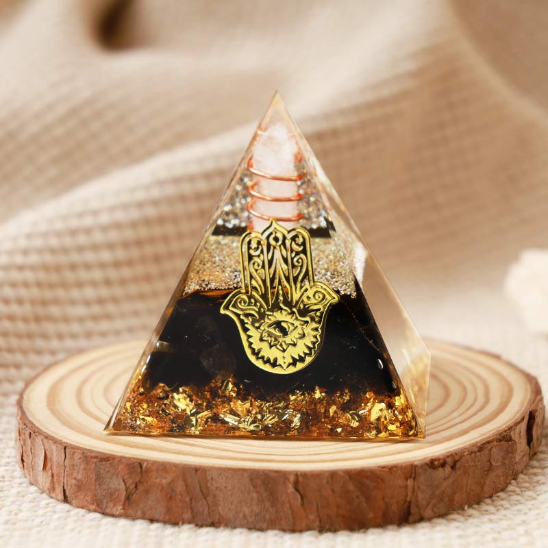 Olivenorma Clear Crystal With Obsidian Hamsa Orgone Pyramid