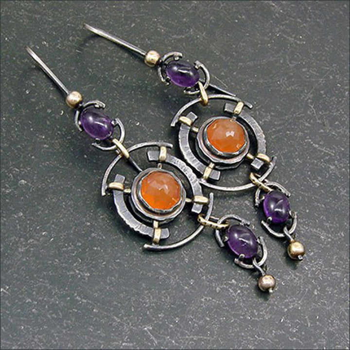 Olivenorma Retro Disc Hollow Inlaid Crystal Witch Earrings